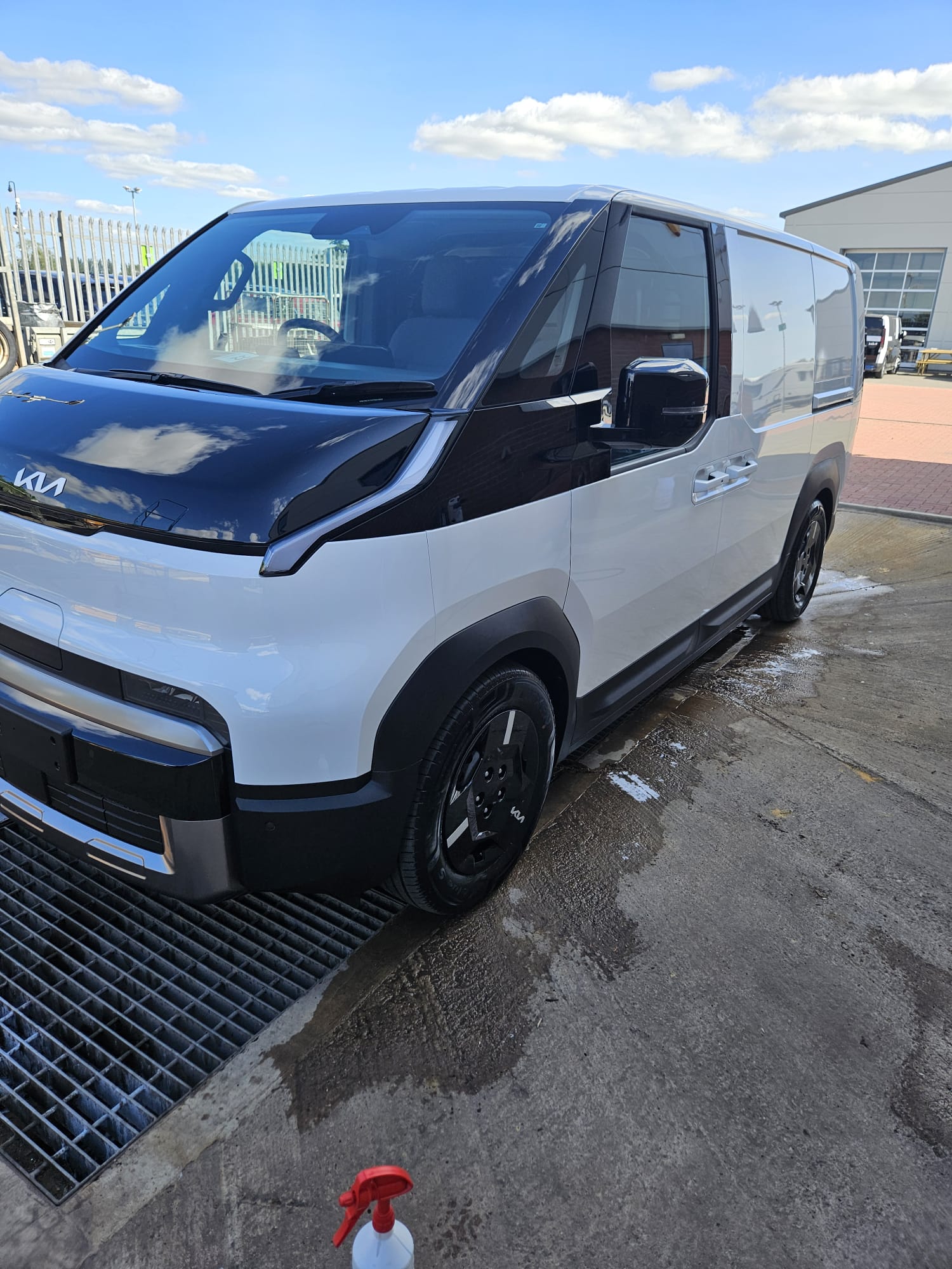 Silver Kia panel van cleaned at a commercial unit