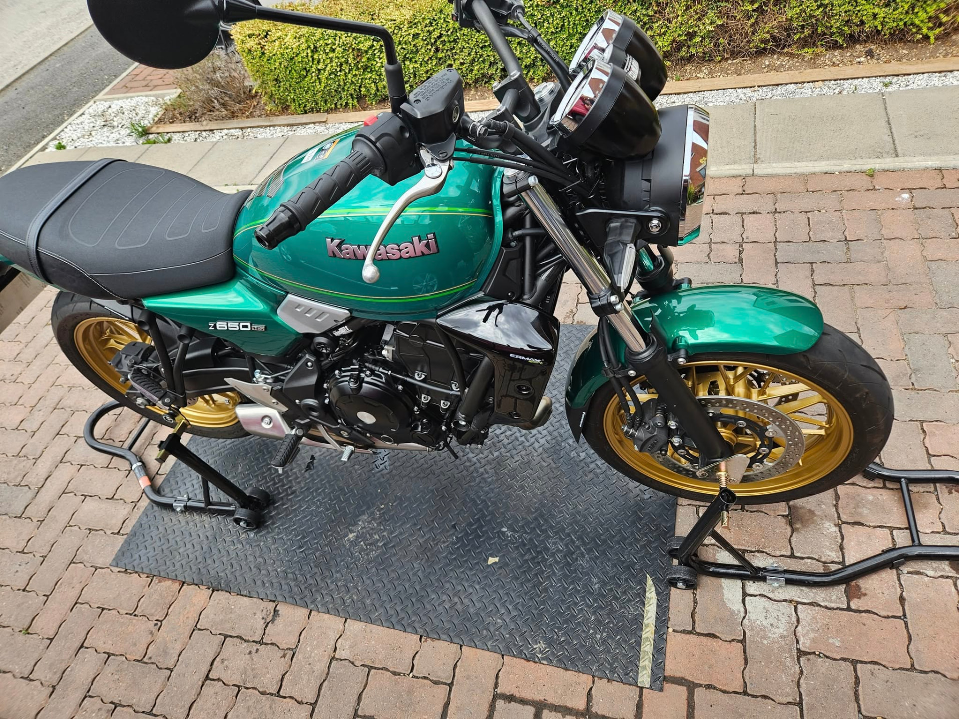 Green Kawasaki Z650 RS motorcycle after detailing by Jeynes Cleans